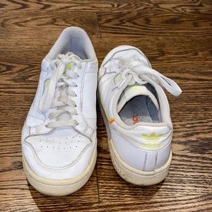 White and neon Adidas sneakers